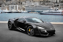 black lykan Hypersport infornt of river